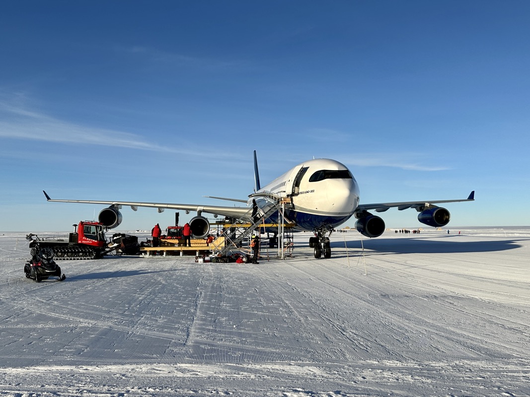 an airplane on a snowy ground