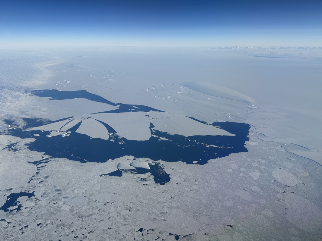 an aerial view of an iceberg