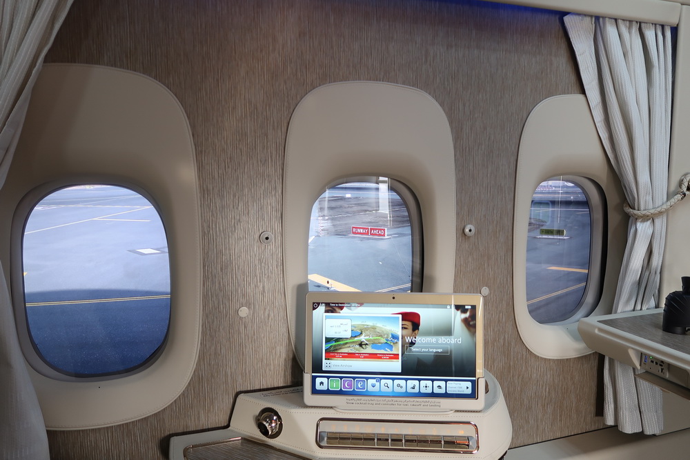 a laptop on a table in a plane