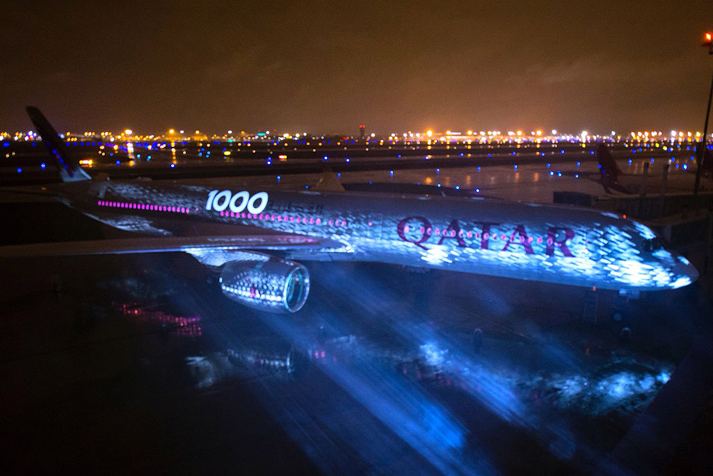a plane taking off at night