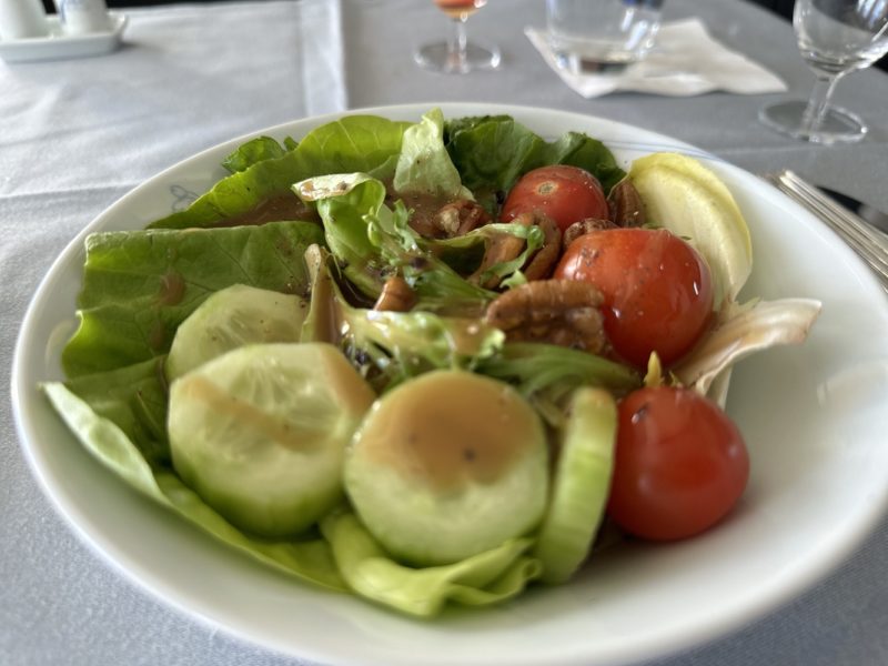 a plate of salad on a table