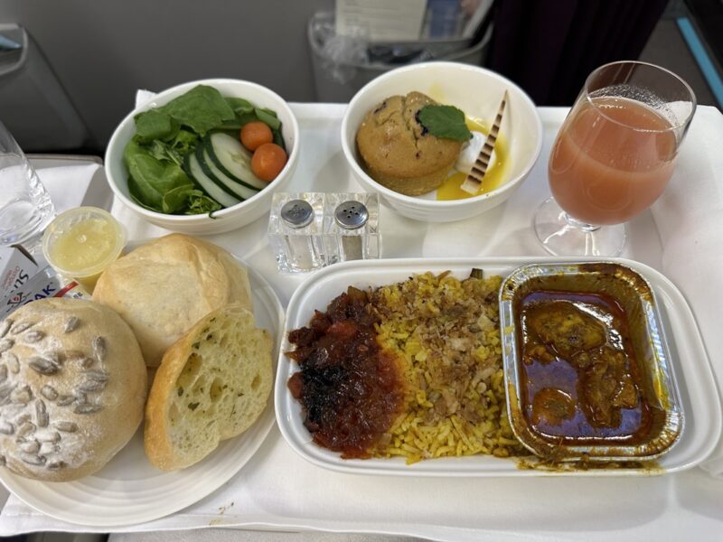 Malaysia Airlines Business Class meal - Chicken Biryani main course with guava juice.