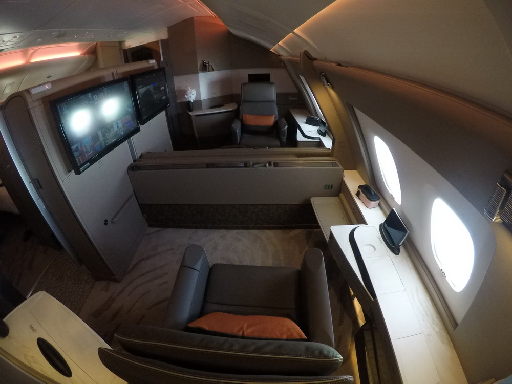 Photo of Singapore Airlines New First Class Suite with bed retracted