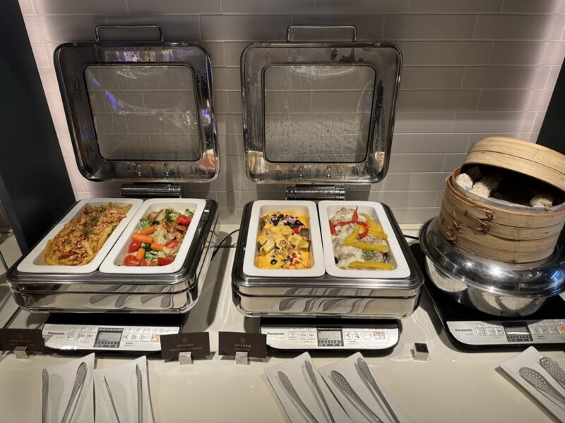 food in a buffet with a container of food