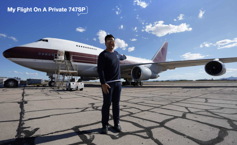 a man standing in front of an airplane